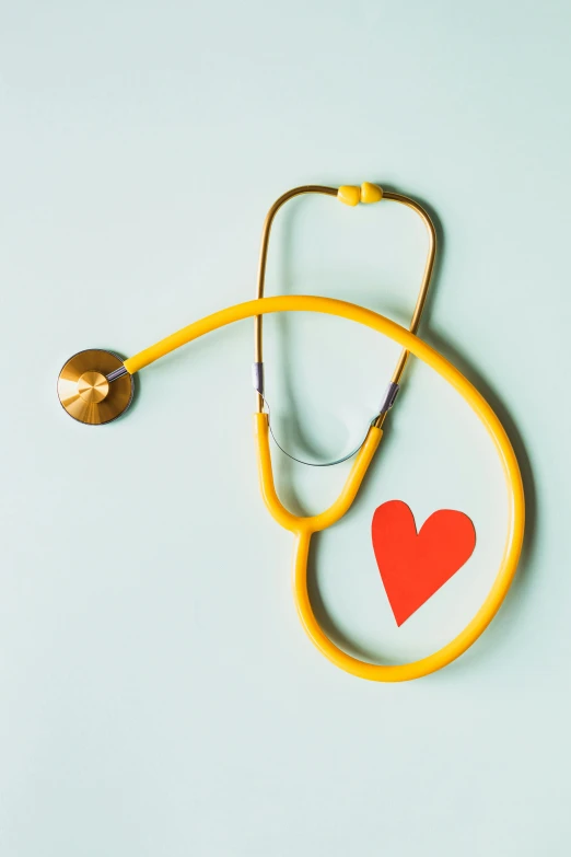 a stethoscope with a red heart on it, yellow, 🚿🗝📝, 1 2 9 7, profile picture