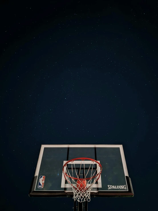 a basketball hoop with a basketball going through it, an album cover, by Matija Jama, pexels contest winner, postminimalism, watching the stars at night, 15081959 21121991 01012000 4k, iphone wallpaper, high angle shot