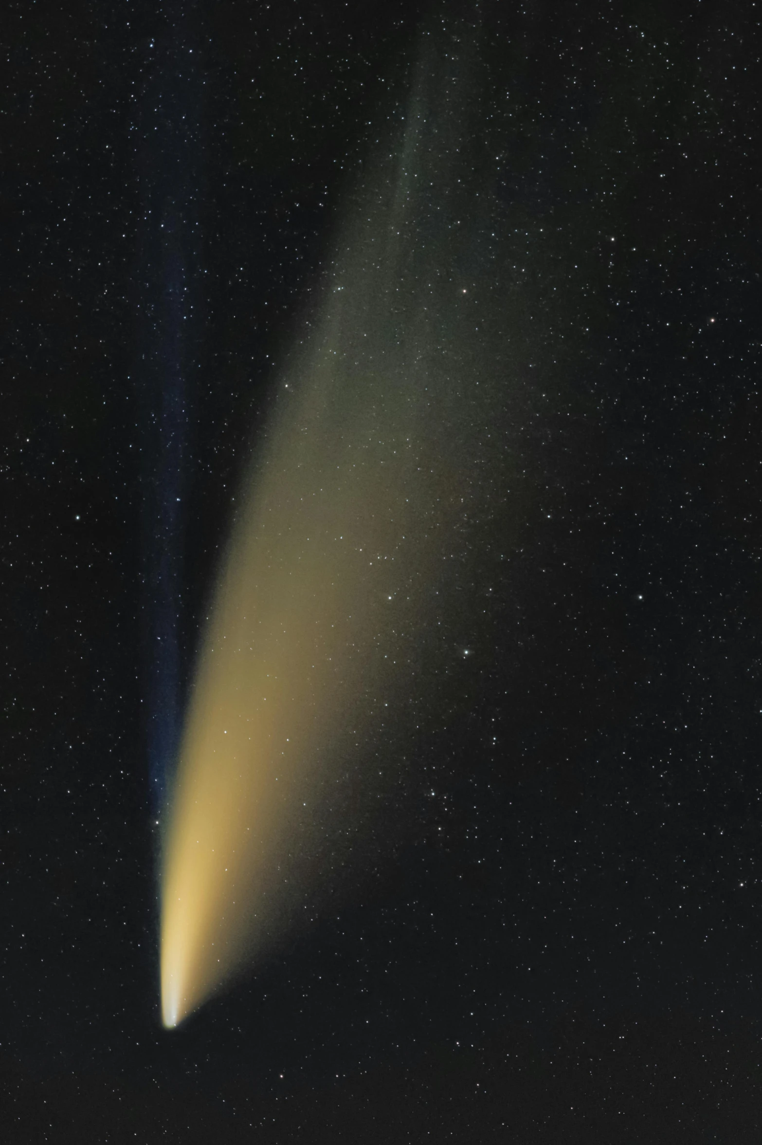 an image of a comet in the sky, by Jason Felix, light and space, yellow volumetric fog, tail fin, close - up photograph, cone