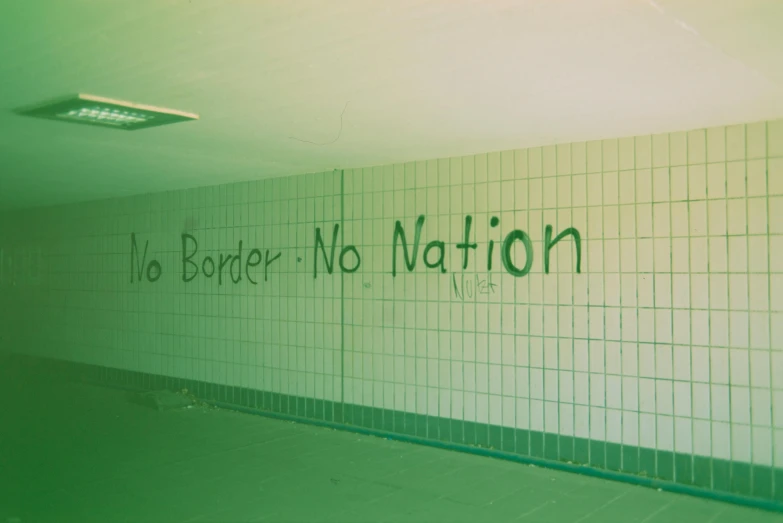 a wall that has some writing on it, an album cover, by Nathalie Rattner, flickr, detention centre, celtics, no green, in school hallway