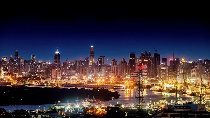 a view of a city at night from the top of a hill, a matte painting, pexels contest winner, gold coast australia, panoramic, cairo, industrial gotham city