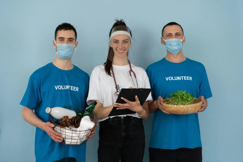a group of three people standing next to each other, pexels contest winner, healthcare worker, serving body, promotional image, vendors