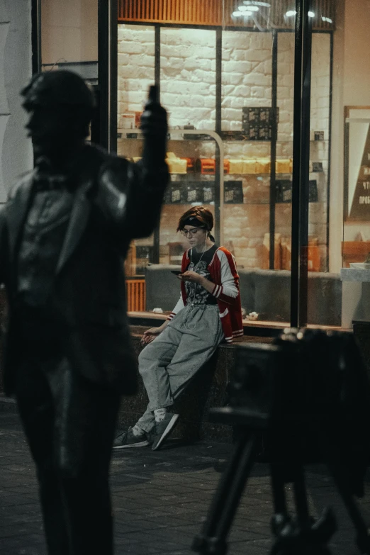 a statue of a man sitting on a bench in front of a store, a statue, inspired by Peter Lindbergh, pexels contest winner, hyperrealism, in foreground boy with shotgun, chappie in an adidas track suit, sitting in a cafe, [ cinematic