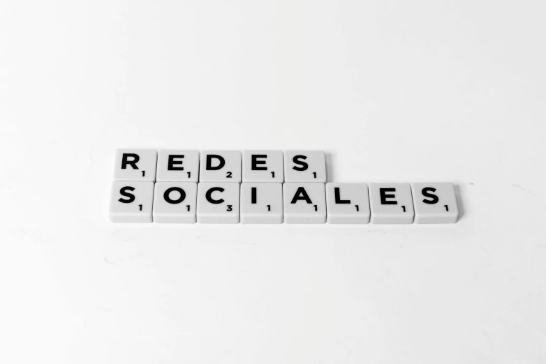 a scrabble with the words redes sociales on it, a picture, by Hirosada II, pexels, remodernism, white background : 3, social realism, redsinski, sales