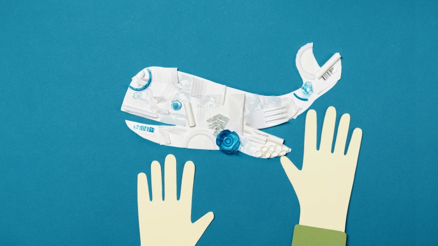 two hands reaching for a paper whale on a blue background, interactive art, made of trash, thumbnail, fan favorite, toothpaste refinery