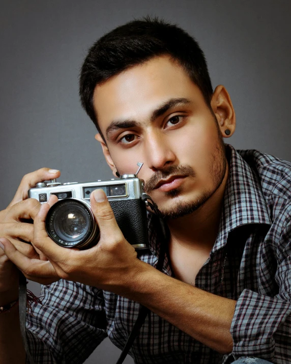 a man taking a picture with a camera, by Cosmo Alexander, art photography, indian super model, lgbt, ((portrait)), cute photo