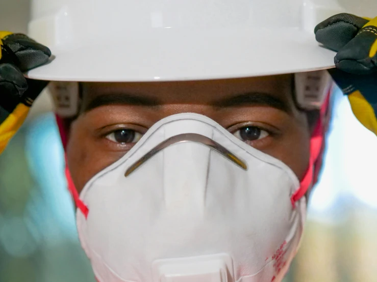 a close up of a person wearing a hard hat, white mask, mkbhd, avatar image, ariel perez