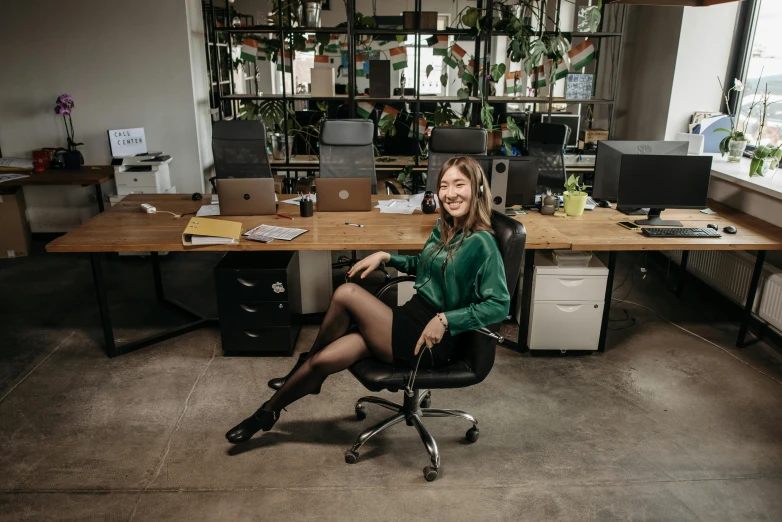 a woman sitting in a chair in an office, a portrait, pexels contest winner, pokimane, avatar image, chengwei pan, engineer