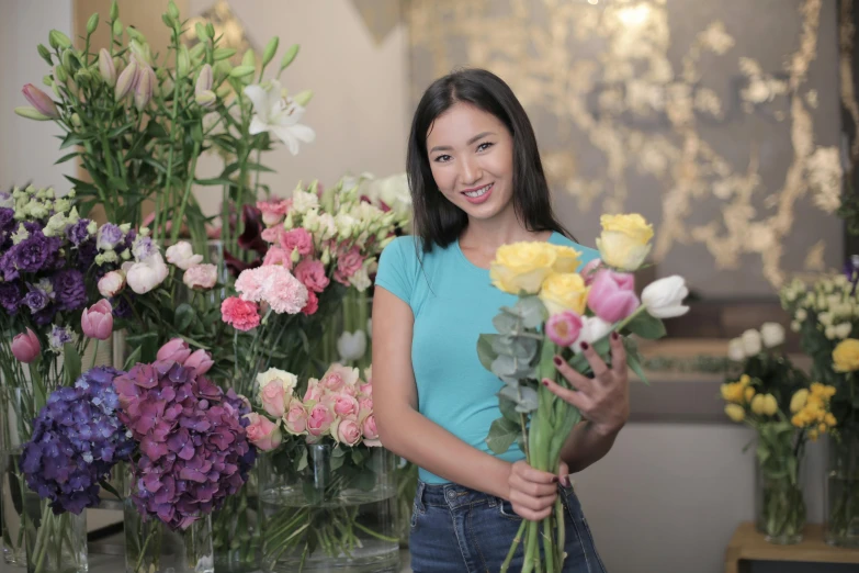 a woman standing in front of a bunch of flowers, avatar image, darren quach, professional closeup photo, low quality photo