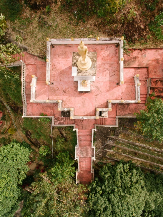 an aerial view of a building surrounded by trees, sitting on temple stairs, nivanh chanthara, 2 5 6 x 2 5 6 pixels, 4k image