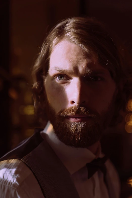 a man with a beard wearing a vest and bow tie, inspired by Gwilym Prichard, renaissance, perfectly lit. movie still, intense lighting, james gleeson, da vinci and jmw turner