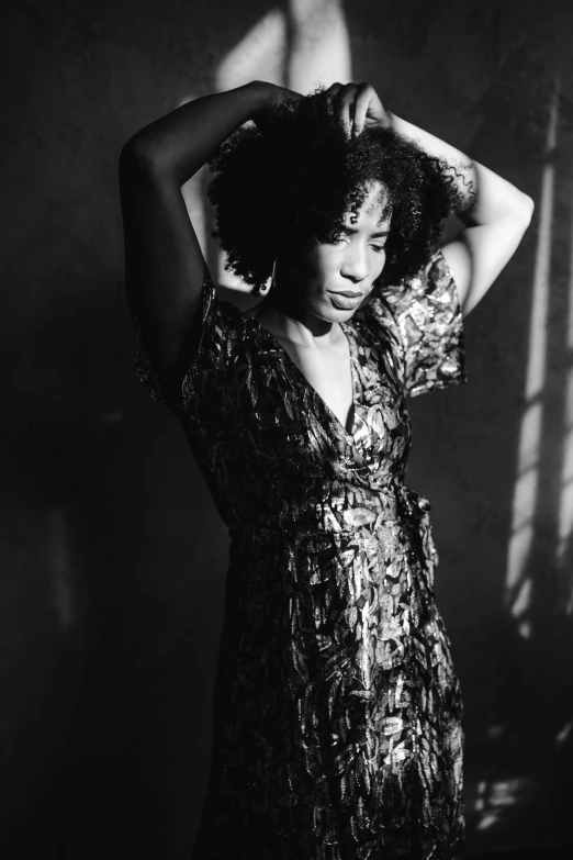 a black and white photo of a woman in a dress, a portrait, by Winona Nelson, pexels contest winner, sza, high contrast dappled lighting, various posed, studio medium format photograph