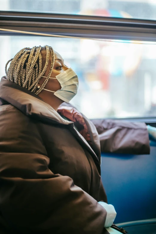 a woman wearing a face mask on a bus, happening, african american, in its dying breath, slide show, square