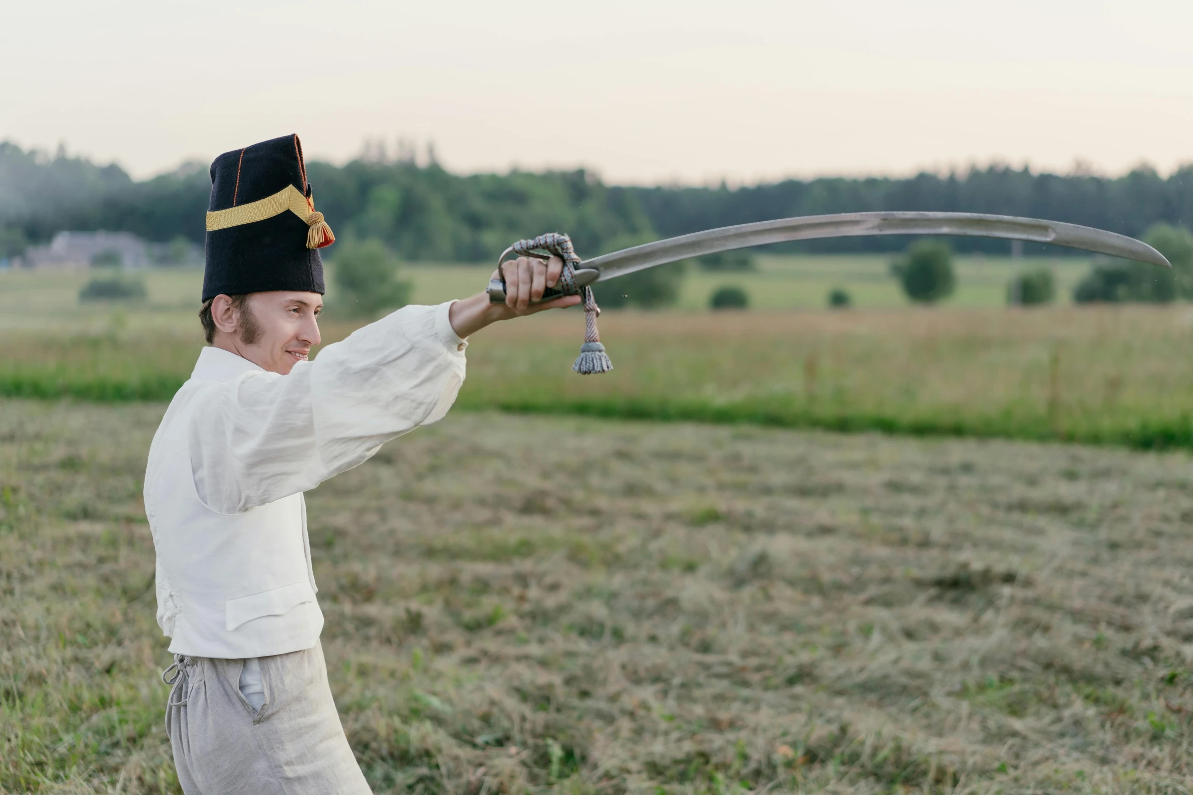 a man with a sword in a field, pexels contest winner, private press, russian style, battle toast, regency-era, production photo