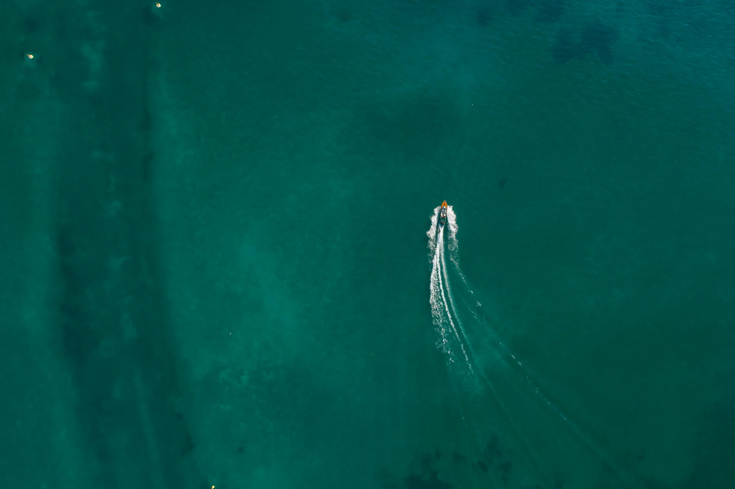 a couple of boats that are in the water, an album cover, by Niko Henrichon, pexels contest winner, minimalism, airborne view, teal aesthetic, concert, thumbnail