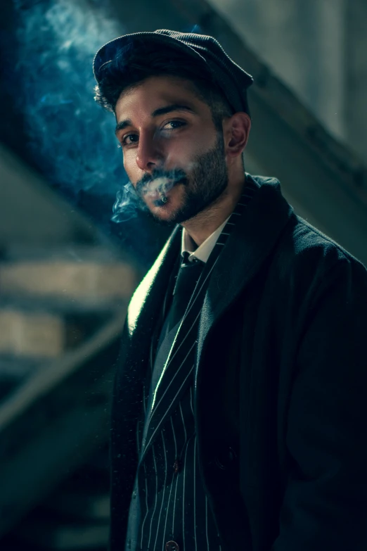 a man in a suit smoking a cigarette, inspired by Vincent Lefevre, trending on pexels, renaissance, zayn malik, shot from cinematic, man wearing a closed cowl, middle eastern