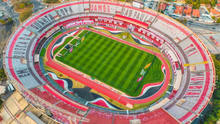 an aerial view of a soccer stadium, pexels contest winner, peru, red and white stripes, 💋 💄 👠 👗, inside a grand