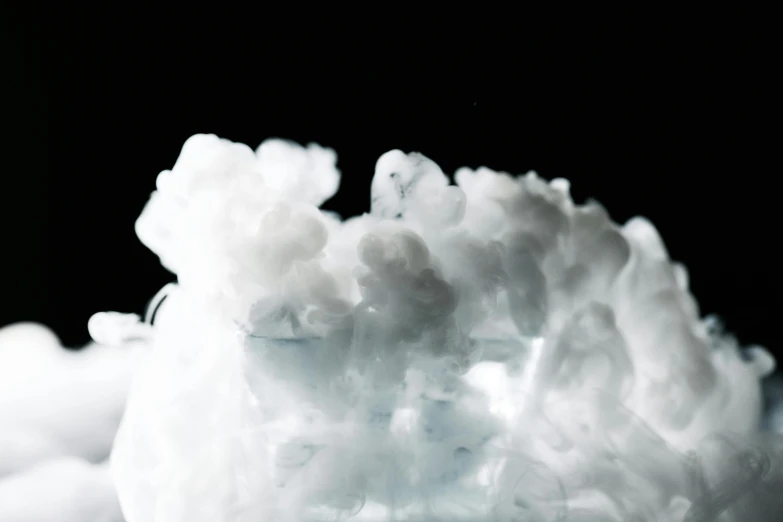 a pile of snow sitting on top of a table, inspired by Kim Keever, unsplash, process art, underwater smoke, close up portrait shot, liquid clouds, milk - bath effect