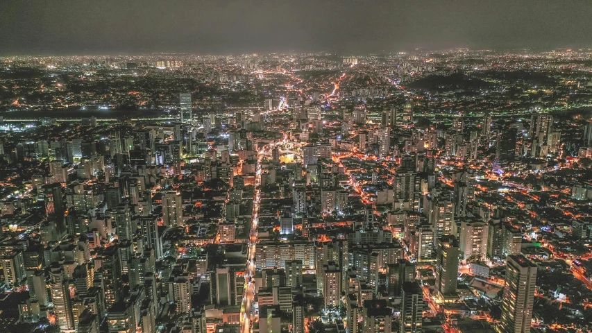 an aerial view of a city at night, by Felipe Seade, são paulo, instagram picture, many details, hdr