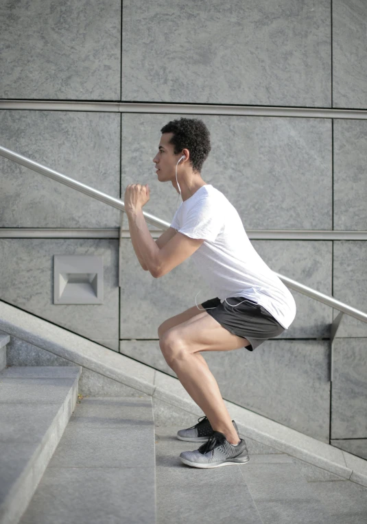 a man riding a skateboard down a flight of stairs, inspired by david rubín, squatting pose, working out, 5k, square