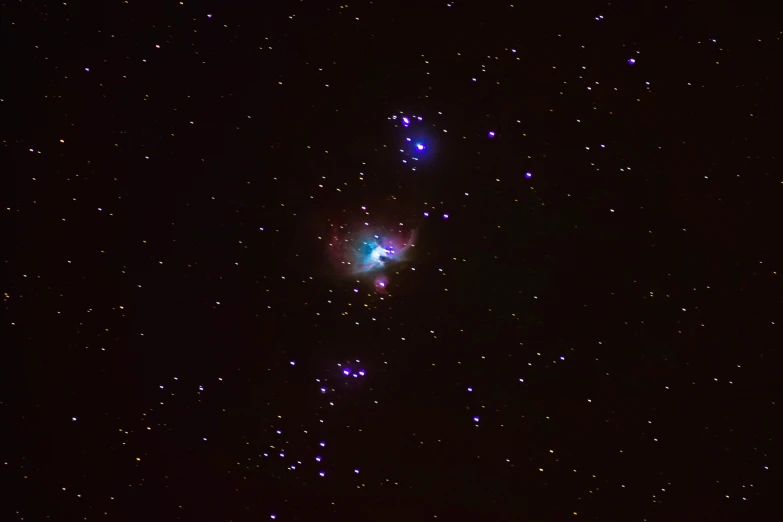 a group of stars that are in the sky, a colorized photo, by Kev Walker, pexels, light and space, purple and blue and green colors, a phoenix, 2 0 0 mm telephoto, london