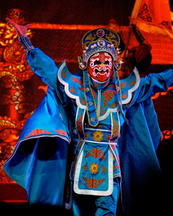 a man that is standing on a stage, inspired by Huang Shen, finely masked, very excited, prideful look, taken in the late 2010s
