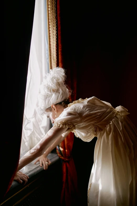 a woman in a white dress leaning on a window sill, inspired by Cecil Beaton, pexels contest winner, rococo, exiting from a wardrobe, ( ( theatrical ) ), the empress’ hanging, slide show