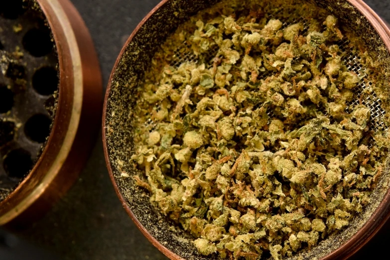 a close up of a bowl of food on a table, hurufiyya, sage smoke, ganja, detailed product image, ultra texture