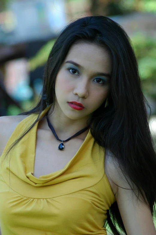 a woman in a yellow top posing for a picture, inspired by Natasha Tan, happening, portrait shot 8 k, 2 0 yo, ..', photo 1 5 mm