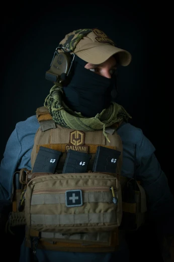 a close up of a person wearing a backpack and a hat, a portrait, reddit, wearing tactical gear, medic, portrait n - 9, gm