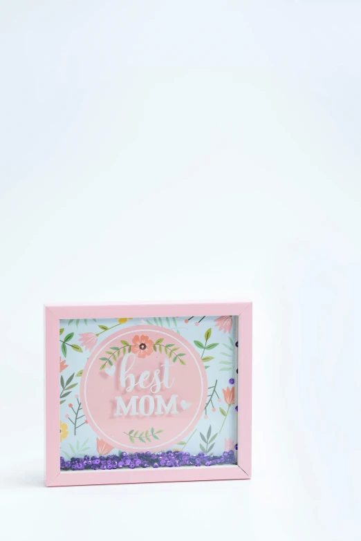 a pink box sitting on top of a white surface, flower frame, your mom, h 9 6 0, 35 mm product photo”