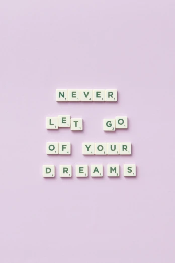 the words never let go of your dreams on a pink background, pexels contest winner, squares, dreamcore aesthetic, white and purple, no bricks