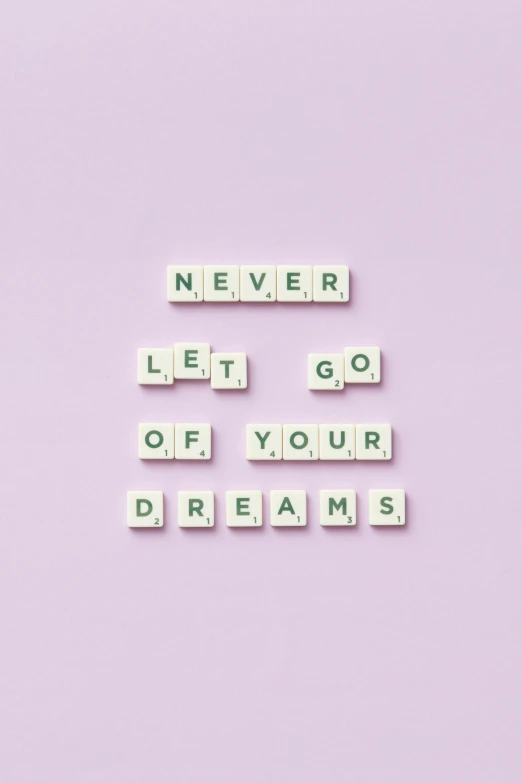 the words never let go of your dreams on a pink background, pexels contest winner, squares, dreamcore aesthetic, white and purple, no bricks