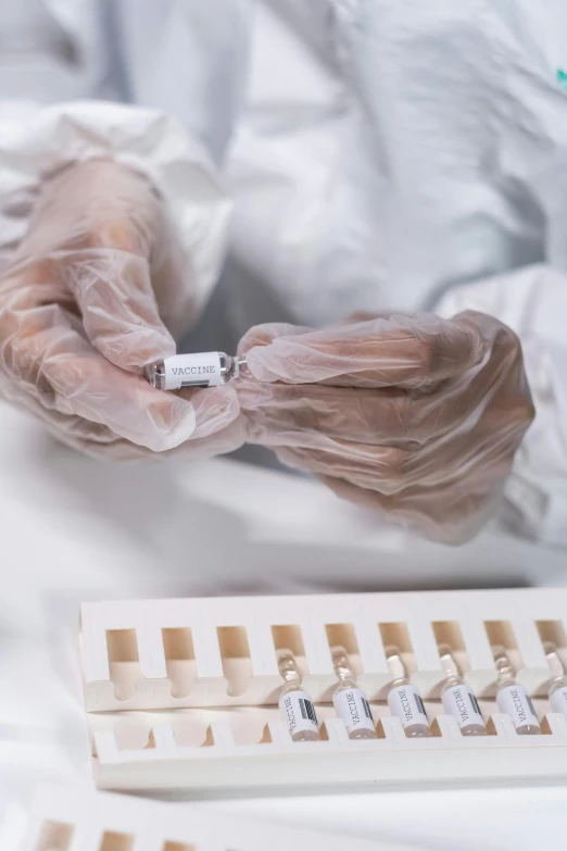 a person in a lab coat holding a syet, by Jason Felix, shutterstock, plasticien, white bandages on fists, 4 0 0 0 samples, instagram picture, 2 mpx quality