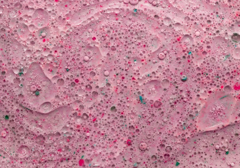 a close up of a pink surface with lots of bubbles, inspired by Howardena Pindell, trending on unsplash, action painting, 4k polymer clay food photography, vanilla smoothie explosion, saatchi art, cake