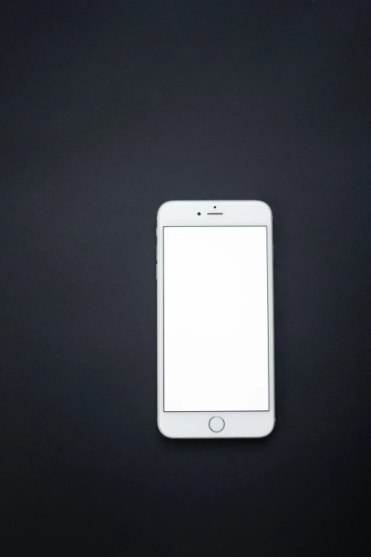 a white iphone sitting on top of a black table, by Matthias Stom, pexels, square, white borders, creamy, black backdrop