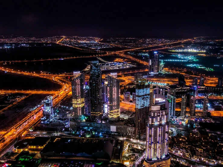 an aerial view of a city at night, pexels contest winner, hurufiyya, dubai, deeply hyperdetailed, dramatic ”