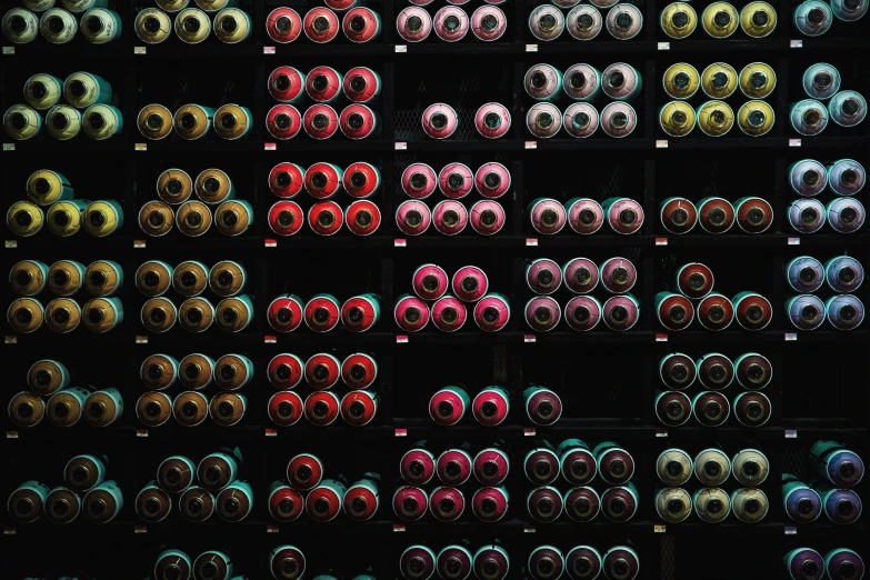 a wall filled with lots of different colored spools, inspired by Andreas Gursky, pexels contest winner, lockers, spray, dark tone, instagram picture