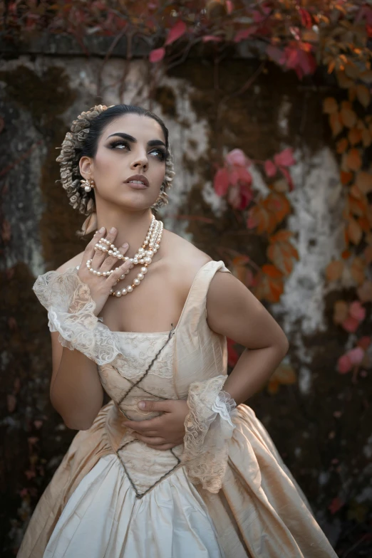 a woman in a wedding dress posing for a picture, a portrait, inspired by Francisco de Burgos Mantilla, pexels contest winner, renaissance, at a fashion shoot, fall season, pearls, halloween