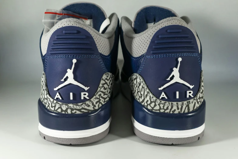 a close up of a pair of air jordan shoes, a picture, blue and gray colors, back facing, ebay listing thumbnail, 2263539546]