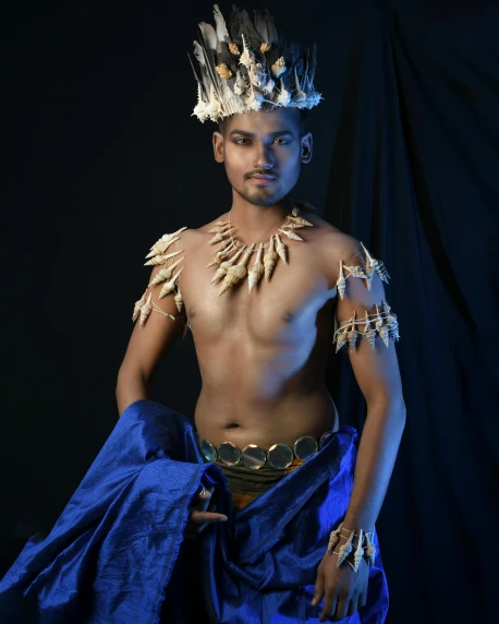 a man in a costume posing for a picture, an album cover, inspired by Maties Palau Ferré, sumatraism, lovely queen, twink, poseidon, profile picture 1024px