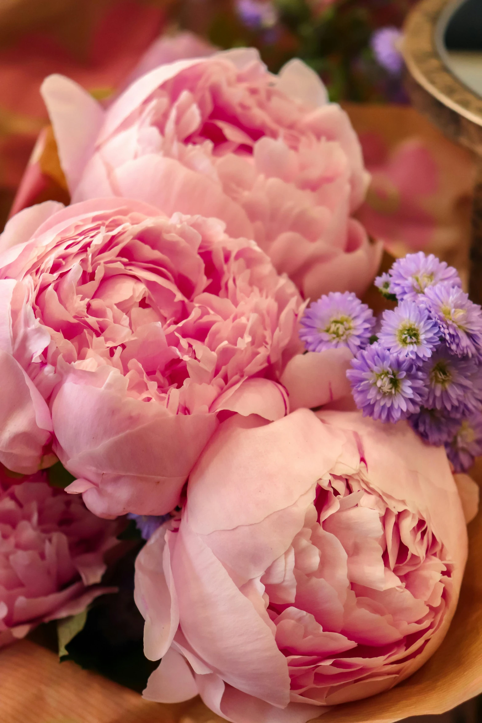 a bunch of pink flowers sitting on top of a wooden plate, up-close, award-winning crisp details”, peonies, zoomed in