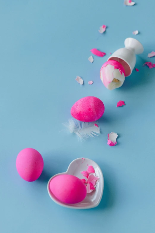 pink and white easter eggs and confetti sprinkles on a blue background, inspired by Jeff Koons, pexels contest winner, behance lemanoosh, eggshell color, hot pink, chalky