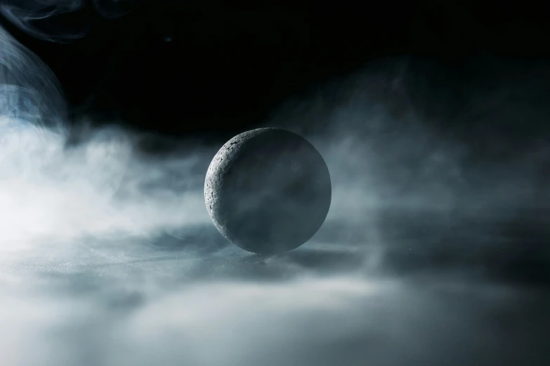 a close up of an object with smoke coming out of it, an album cover, inspired by Michal Karcz, unsplash contest winner, large detailed moon, fantasy style 8 k octane render, black fog, sphere