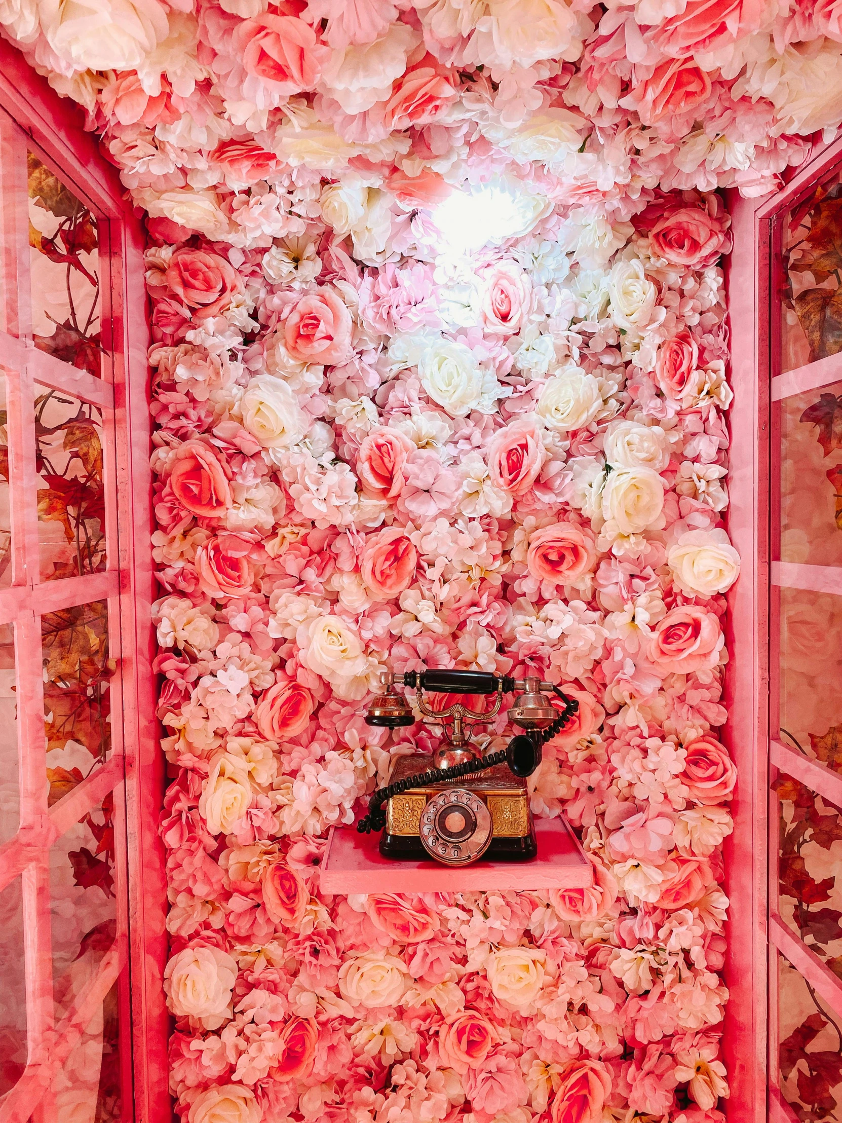 a phone booth decorated with pink and white flowers, by Robbie Trevino, romanticism, a crystalline room, ((pink))