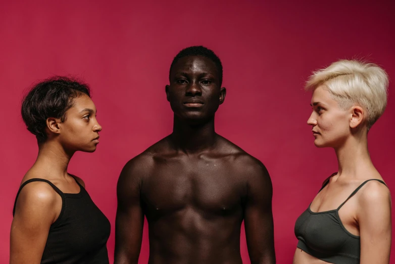 a man and two women standing next to each other, trending on pexels, hyperrealism, man is with black skin, pink body, concerned, fit physique