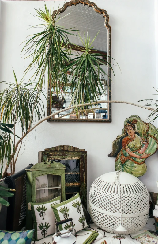 a living room filled with lots of furniture and plants, a portrait, hindu aesthetic, view from behind mirror, - 9, palm