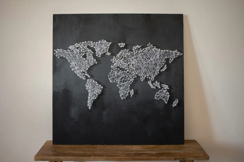 a blackboard with a string world map on it, a detailed painting, interactive art, metal art, instagram art, “diamonds, made out of shiny white metal