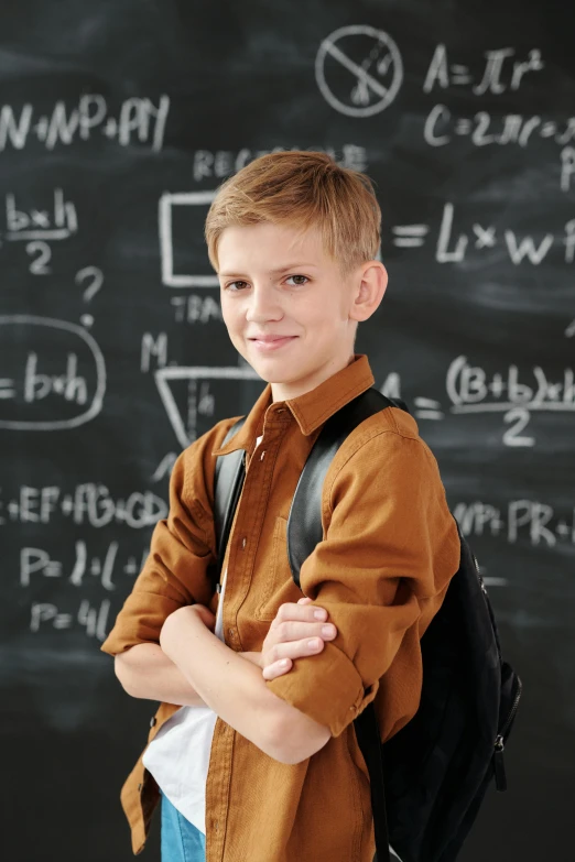 a young boy standing in front of a blackboard, shutterstock, danube school, blonde guy, 15081959 21121991 01012000 4k, brown, thumbnail