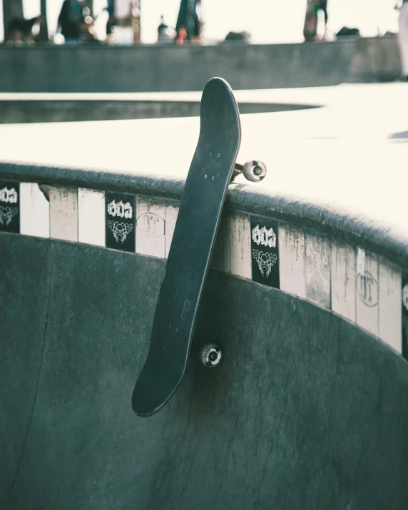 a man riding a skateboard up the side of a ramp, by Adam Rex, pexels contest winner, panel of black, faded worn, lil peep, bench